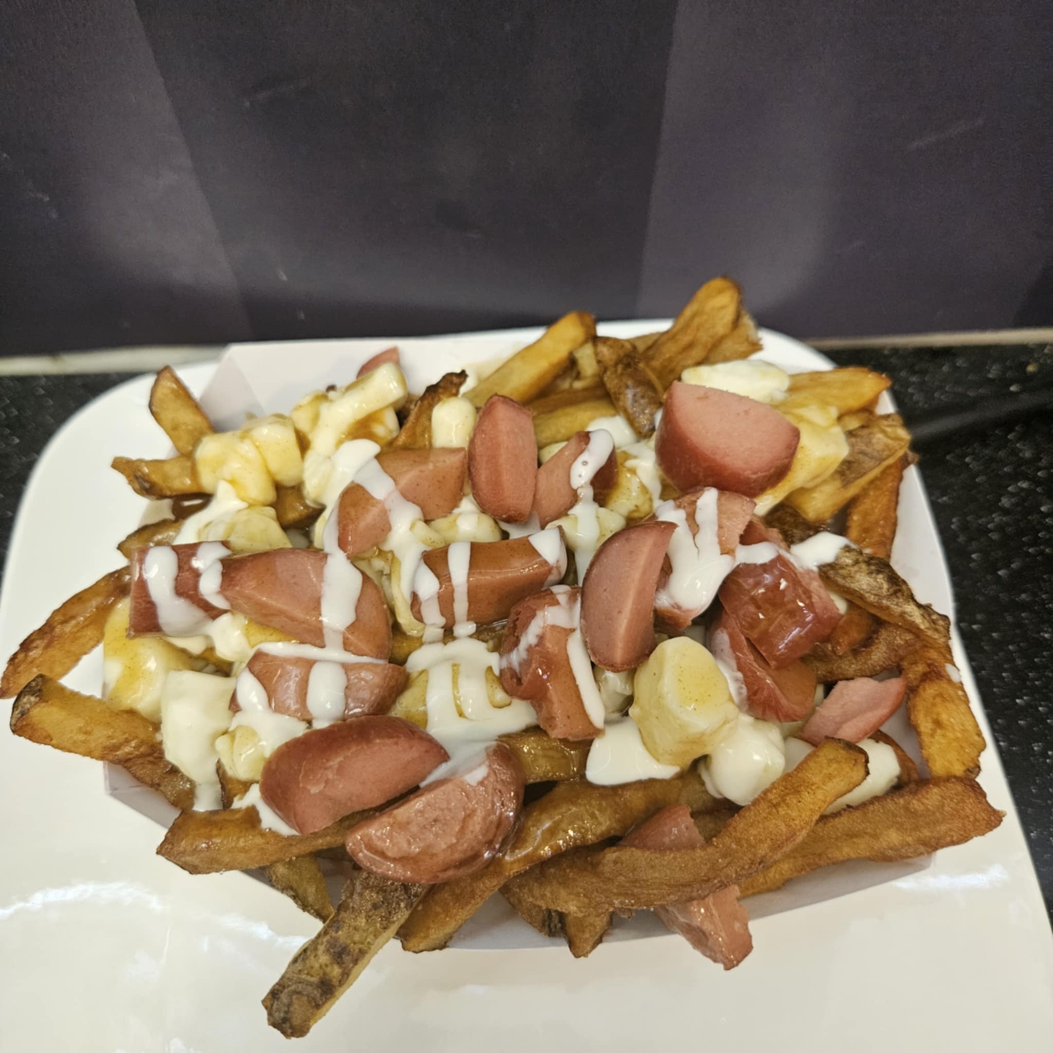 D&B Poutine with hotdog<br> (Image needed)